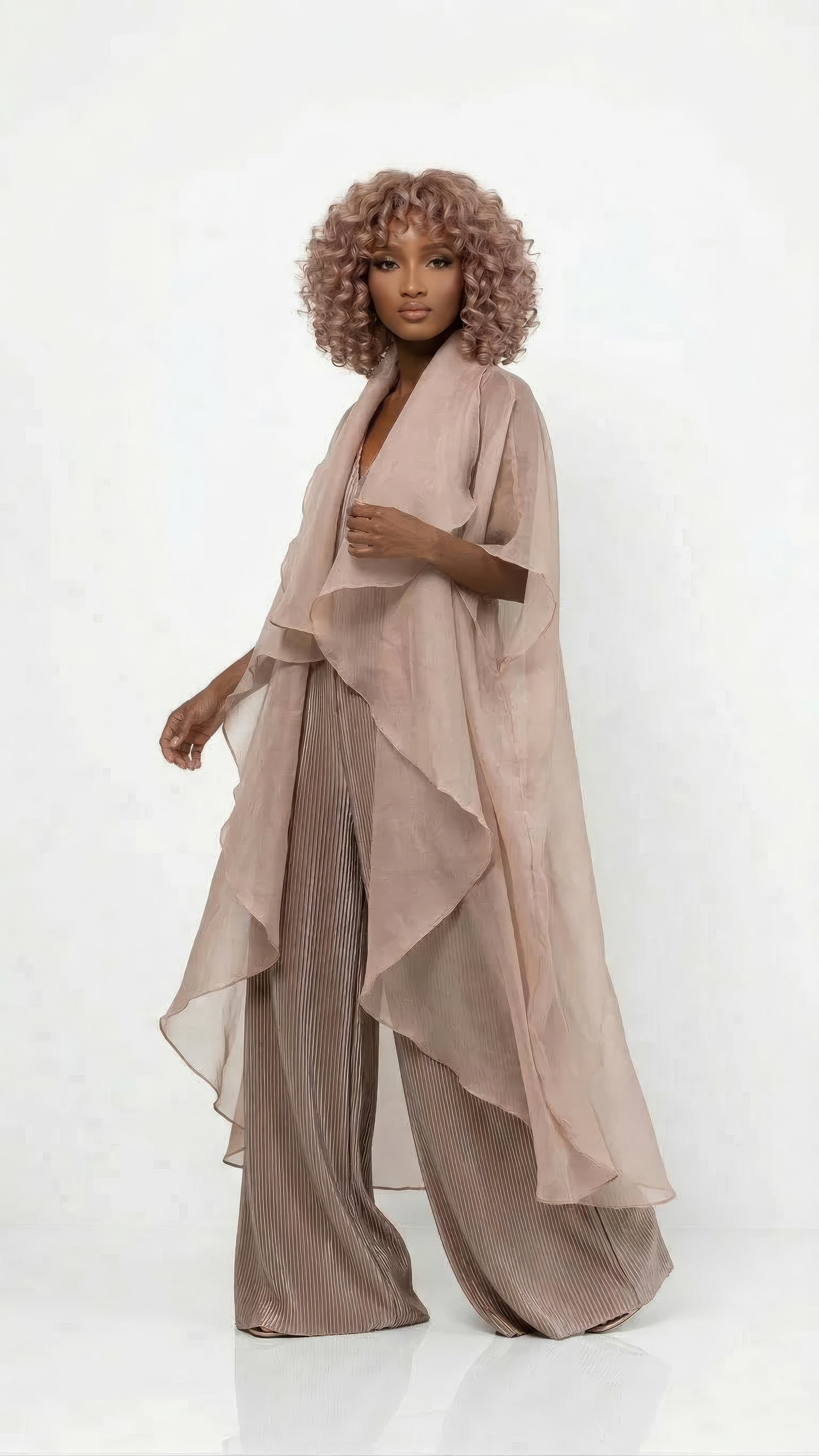 Saeeda Set in taupe worn by a model.