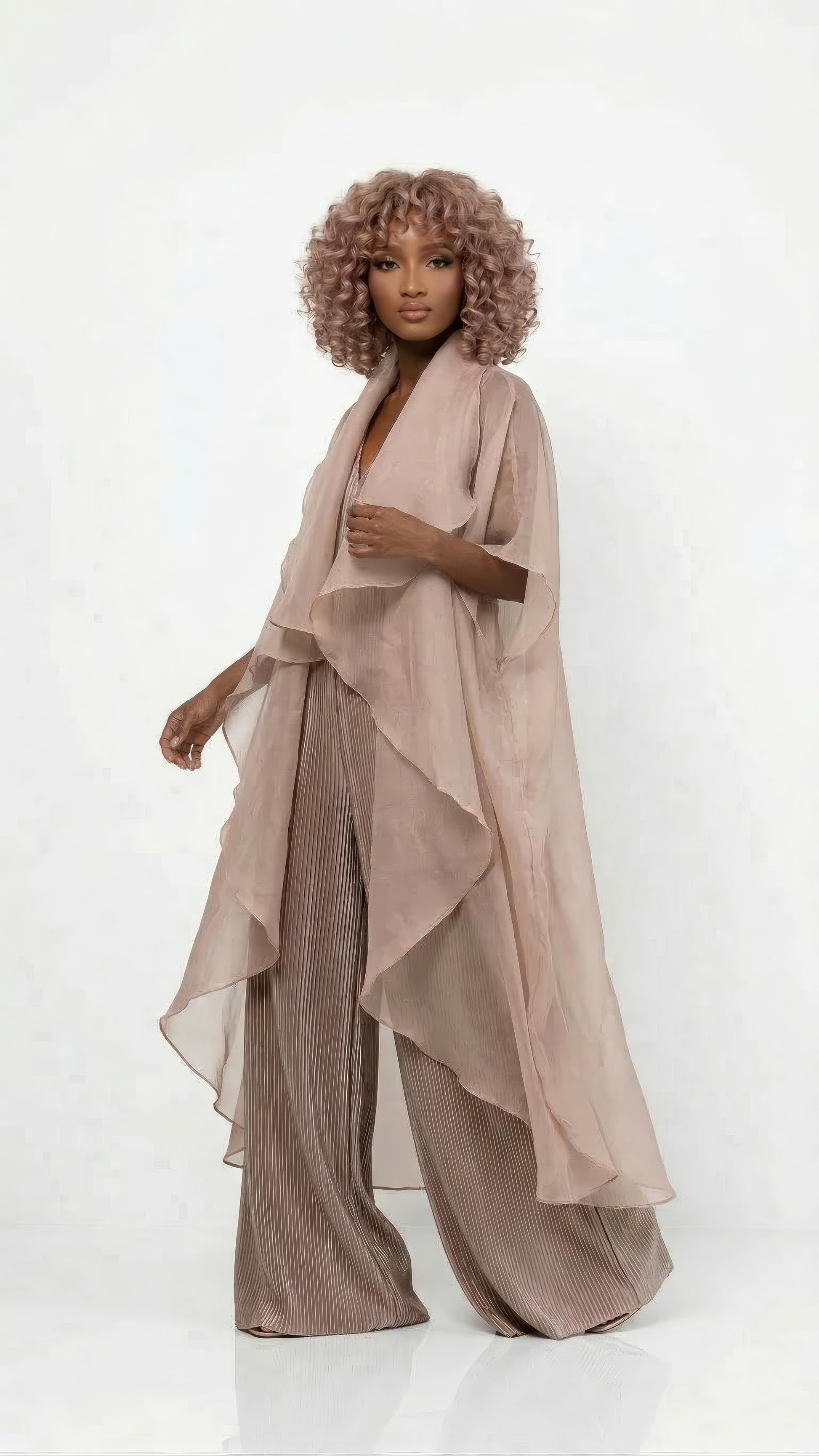 Saeeda Set in taupe worn by a model.
