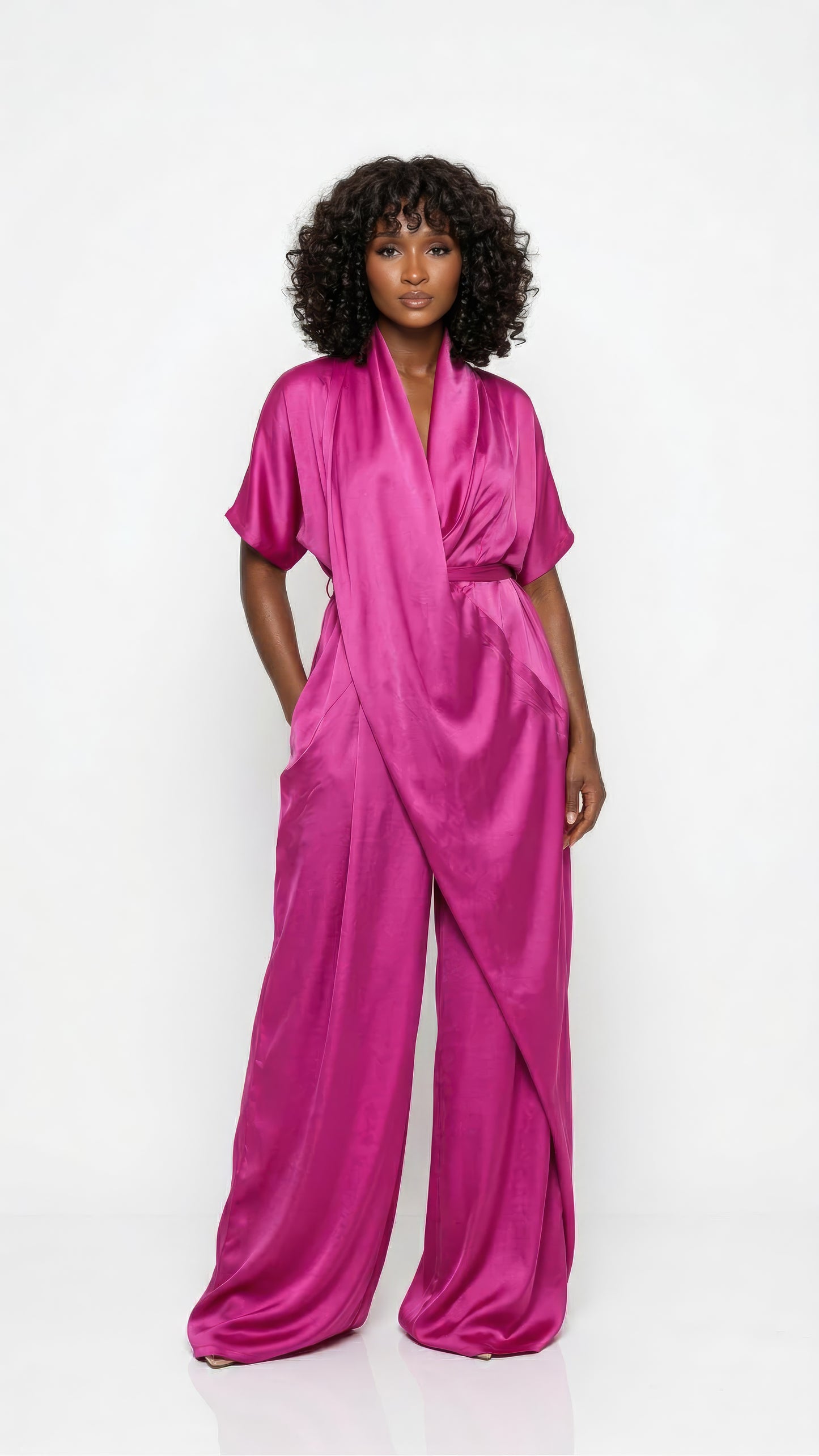 Pink Anisah Jumpsuit from Nahota Kanma, made from Duchess Satin with wide-leg, draped neckline and batwing sleeves.