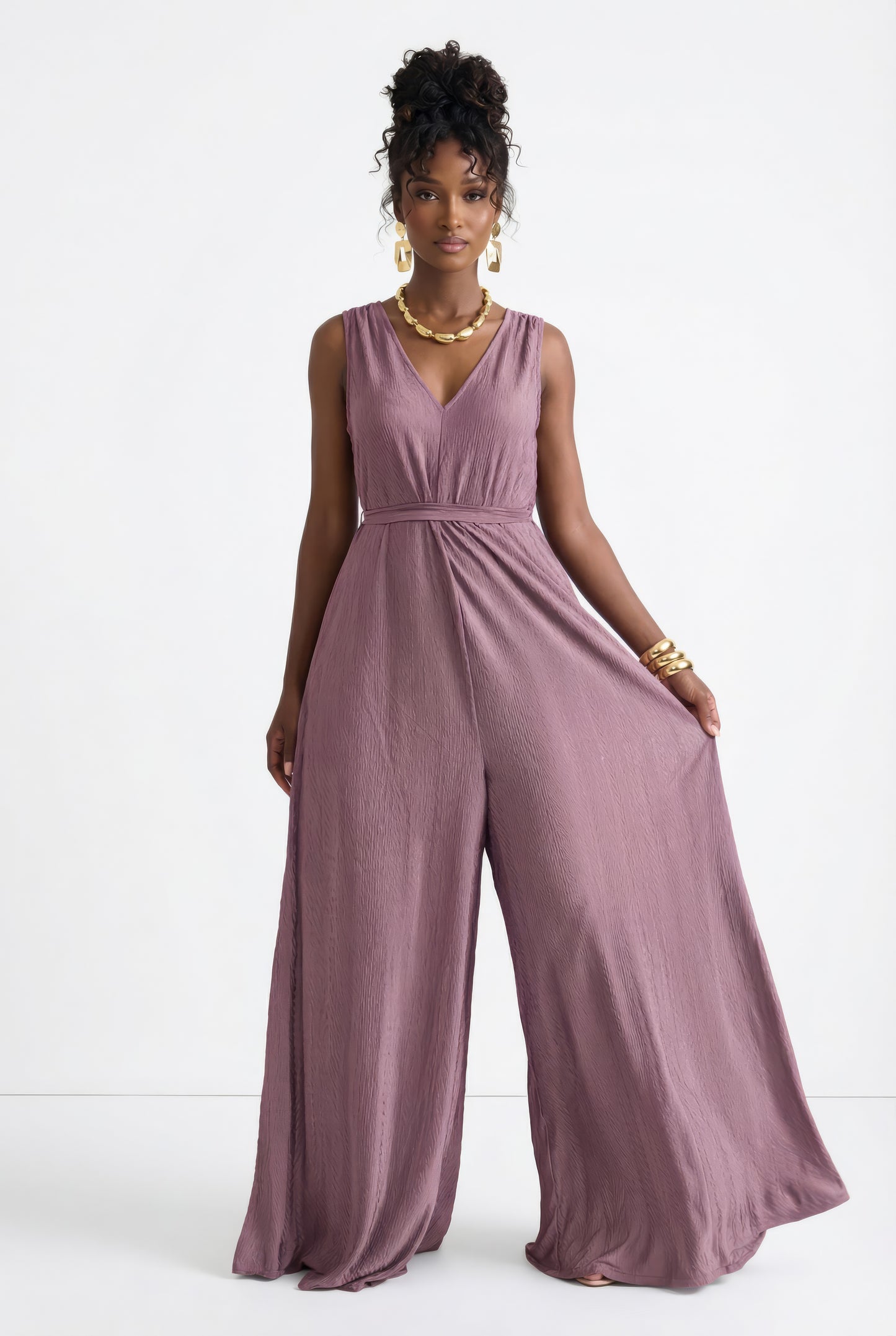 Saeeda Jumpsuit in striking lavender rose on a model