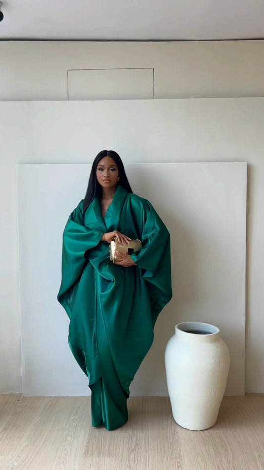 Emerald green Farida Set (silk satin blouse and top/kimono) from Nahota Kanma, featuring oversized batwing sleeves and draped silhouette.
