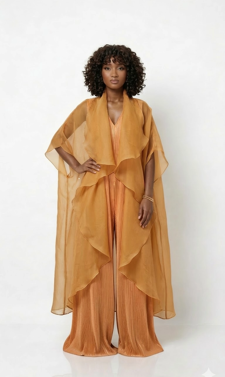 Saeeda Set in burnt orange worn by a model.